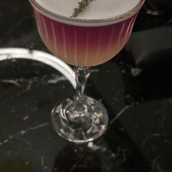 The Boheme - Lavender Martini with a lavender leaf on top very it looked very fancy. - Breakfast & Brunch Near Me - Orlando, Florida The Boheme - Lavender Martini with a lavender leaf on top very it looked very fancy. - Breakfast & Brunch Near Me - Orlando, Florida