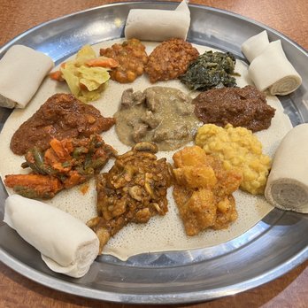Blue Nile Cafe - Sampler Platter Combo Dinner - Ethiopian Near Me - Kansas City, Missouri Blue Nile Cafe - Sampler Platter Combo Dinner - Ethiopian Near Me - Kansas City, Missouri