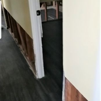 Optimal Solutions - this entire unit had wall portions removed, nice straight cuts made putting the new drywall back up go faster - Demolition Services Near Me