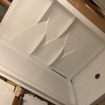Fosterz Construction - Installing new shower and floor - General Contractors Near Me
