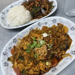 Dak Der Asian Food - Laotian Pad Thai (bottom) and chicken Kra pao (top).
