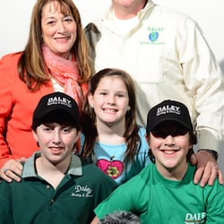 Daley Moving & Storage - Owners Gina and Jeffrey Bunch with three of their children.