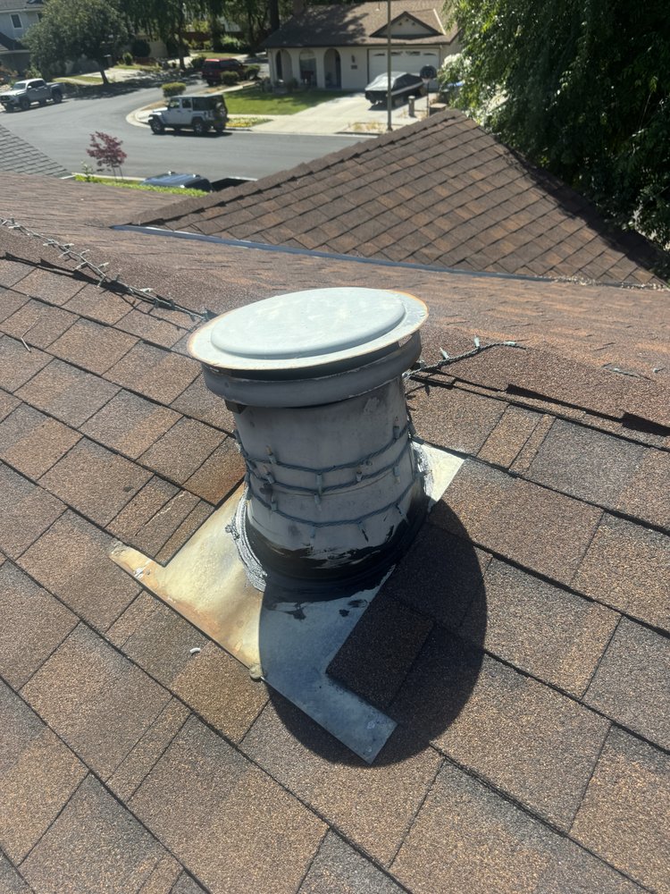 Slide of Essentials Roofing