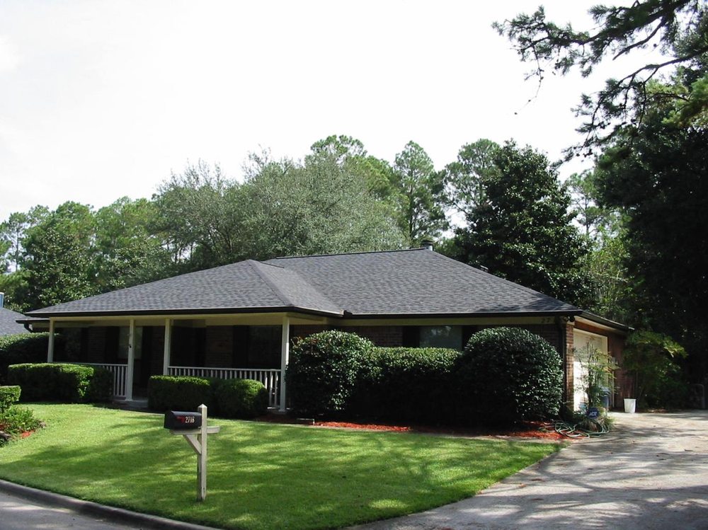 Slide of Total Quality Roofing