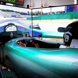 The Race Room - Our guest racing in the Petronas Simulator.
