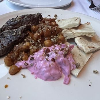 Canoe - Peppercorn Crusted Kangaroo, Naan, Spiced Chickpea, Beets, Coconut Crunch - New American Near Me - Atlanta, Georgia