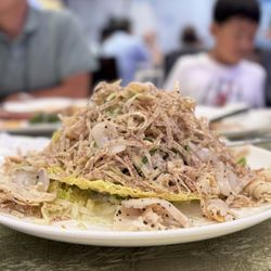 Fusion Delight - Geoduck tossed in truffle and fried taro