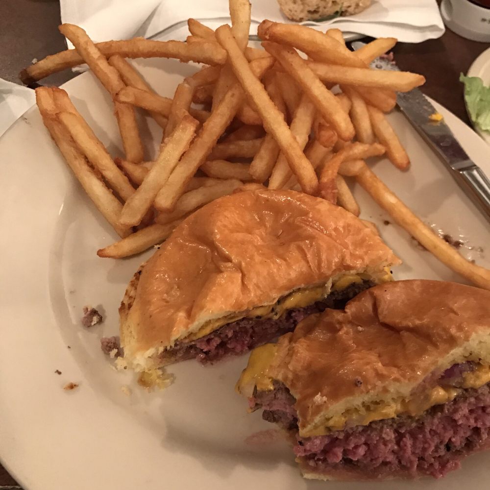 Monica's - Half pound burger with fries. - Italian Near Me - Coralville, Iowa