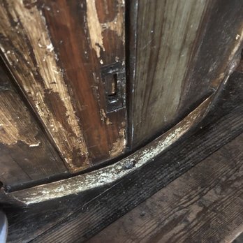 Moonshine Drinkery - a close up of a wooden door - Cocktail Bars Near Me - Victoria, Texas