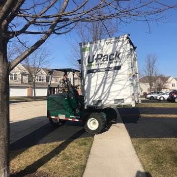 U-Pack Moving - Being loaded on flatbed truck in Chicago 12/14/20 - Movers Near Me - South Elgin, Illinois