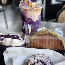 Macs By Icky - Ube tres leche cake (left), ube all day halo halo (middle back), ube pistachio ice cream taco (right), ube crinkle cookie (front)