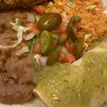 Chuy's - Beef Chile Relleno & Chicken Enchilada w/ verde sauce and cheese sauce on the side. - Tex-Mex Near Me - Orlando, Florida Chuy's - Beef Chile Relleno & Chicken Enchilada w/ verde sauce and cheese sauce on the side. - Tex-Mex Near Me - Orlando, Florida