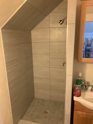 Shower Remodel - This remodel was done on a shower that was leaking to the downstairs of the clients home. We were able to demolish the shower and address the water damage and build them a new shower from scratch. Client was very happy there was no longer anymore leaking. Shower Remodel - This remodel was done on a shower that was leaking to the downstairs of the clients home. We were able to demolish the shower and address the water damage and build them a new shower from scratch. Client was very happy there was no longer anymore leaking.