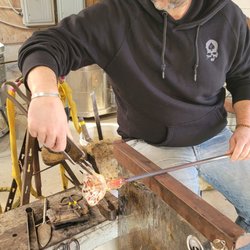 Nashville Glassblowing - Student making a flower.