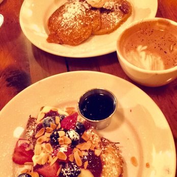 Marigold Kitchen - Buttermilk Pancakes with Whipped Orange Almond Butter, & Decadent French Toast with warm maple syrup and a mocha! - Breakfast & Brunch Near Me - Madison, Wisconsin Marigold Kitchen - Buttermilk Pancakes with Whipped Orange Almond Butter, & Decadent French Toast with warm maple syrup and a mocha! - Breakfast & Brunch Near Me - Madison, Wisconsin