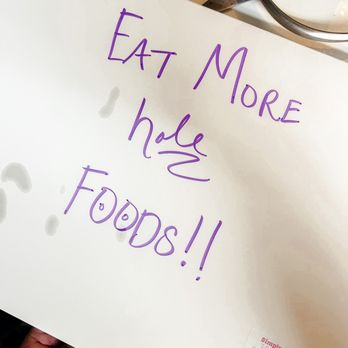 Simply Done Donuts - a hand holding a sign that says eat more nice foods - Food Trucks Near Me - Dunwoody, Georgia Simply Done Donuts - a hand holding a sign that says eat more nice foods - Food Trucks Near Me - Dunwoody, Georgia