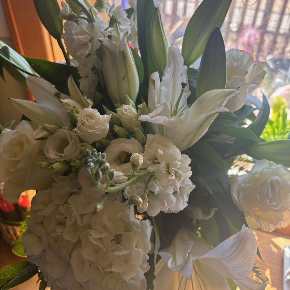 Niko's Flowers - This is the actual arrangement that was delivered to my friend. Clearly, the vase is different. - Florists Near Me - Chicago, Illinois