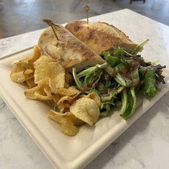 Minneapolis Cider Company - Club sandwich ($15). Turkey, ham, bacon, lettuce, tomato, and mayo on a baguette, with side salad and kettle chips. - Cideries Near Me - Minneapolis, Minnesota