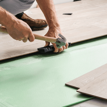 Carpet Exchange - a man sanding a hardwood floor - Flooring Near Me - Parker, Colorado Carpet Exchange - a man sanding a hardwood floor - Flooring Near Me - Parker, Colorado