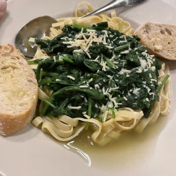 Fellini's - Spinach & Pasta. Do we not drain pasta anymore? SO bland with no flavor of butter, olive oil and roasted garlic. - Pizza Near Me - Norfolk, Virginia Fellini's - Spinach & Pasta. Do we not drain pasta anymore? SO bland with no flavor of butter, olive oil and roasted garlic. - Pizza Near Me - Norfolk, Virginia