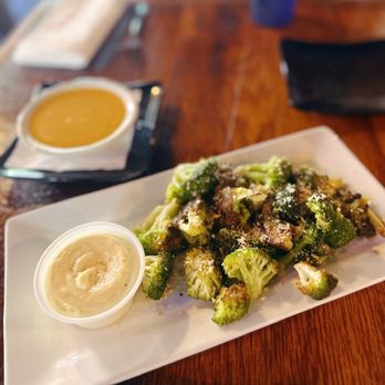 The Quiet Pint Tavern - Charred Broccoli (with side of beer cheese) - Cocktail Bars Near Me - Winston-salem, North Carolina The Quiet Pint Tavern - Charred Broccoli (with side of beer cheese) - Cocktail Bars Near Me - Winston-salem, North Carolina