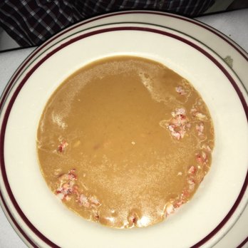 Bones - View of crab bisque. They pour it in the bowl for you from cup. - Steakhouses Near Me - Atlanta, Georgia Bones - View of crab bisque. They pour it in the bowl for you from cup. - Steakhouses Near Me - Atlanta, Georgia