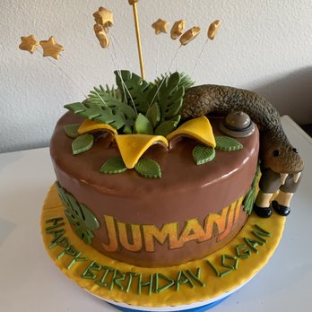Tasteful Food Artistry - a chocolate cake with fondant decorations - Custom Cakes Near Me Tasteful Food Artistry - a chocolate cake with fondant decorations - Custom Cakes Near Me