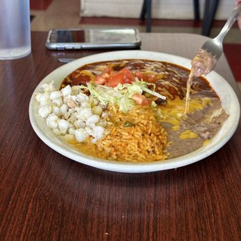 El Comal - a plate of mexican food on a table - Mexican Near Me - Santa Fe, New Mexico
