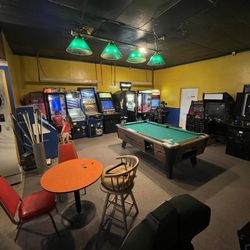Moon Arcade - Rear West wall. Pool table, darts, Photo Booth, prize machines.