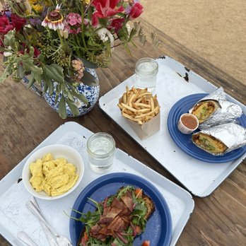 The Barn - Avocado toast with bacon, scrambled eggs on the side. Breakfast burrito with a side of fries - Burgers Near Me - Half Moon Bay, California The Barn - Avocado toast with bacon, scrambled eggs on the side. Breakfast burrito with a side of fries - Burgers Near Me - Half Moon Bay, California