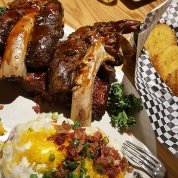 Bobby Q - Mesa - Beef ribs on top of st.louis ribbs with fully decked out mashed potatoes - New American Near Me - Mesa, Arizona