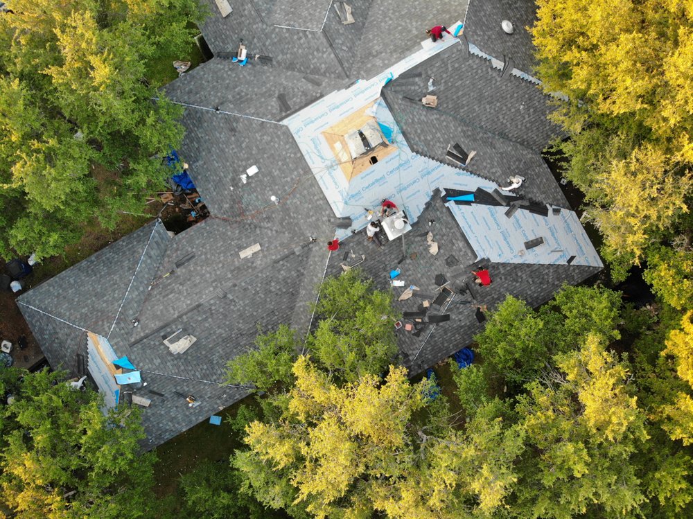 Slide of Top Notch Roofing