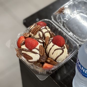 Drip - Dessert Lounge - a plastic container of ice cream and strawberries - Desserts Near Me - Chicago, Illinois