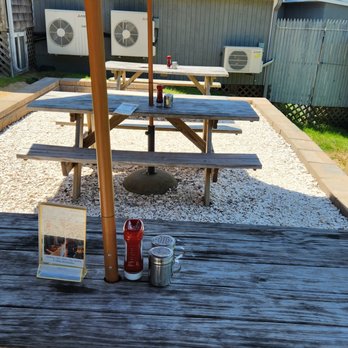 Moby Dick's - outdoor seating for pets around back out of the east wind - Seafood Near Me - Wellfleet, Massachusetts