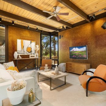 Storybook Styling - When removing brown carpeting on the walls isn't an option - prior sound studio turns cool and bright Mid-Century Mod. Storybook Styling - Home Staging Near Me