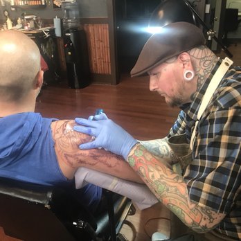 Destiny City Tattoo - Miko working his magic. - Tattoo Near Me - Tacoma, Washington