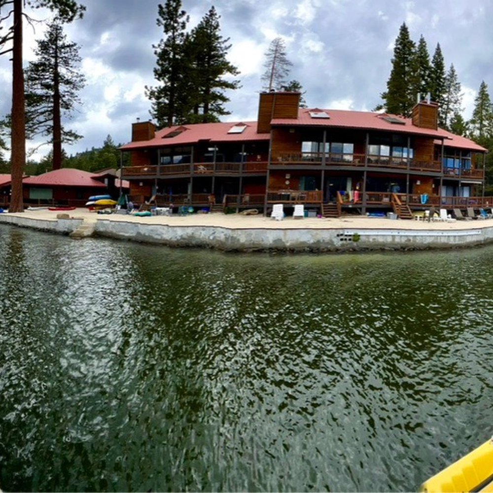 Donner Lake Village - Standing on the boat dock in Donner Lake with Donner Lake Village in the Center. - Hotels Near Me - Truckee, California