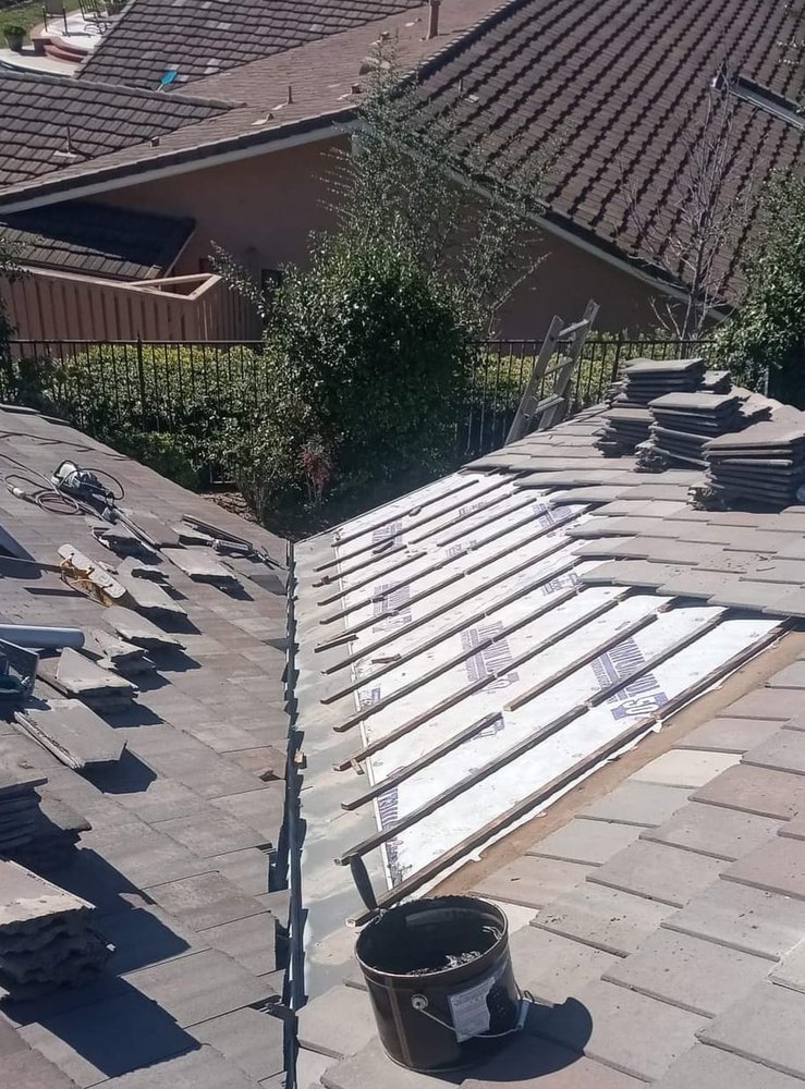 Slide of Francisco's Roof Maintenance