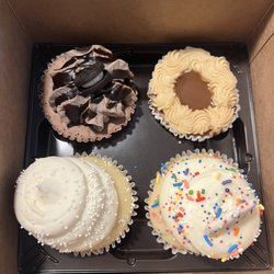Gigi's Cupcakes of Fargo - Oreo cheesecake  Salted caramel cheesecake  Wedding cake