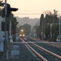 Caltrain - Hillsdale Station - 27 February 2019 - A Union Pacific freight train crosses the original 25h Avenue crossing.