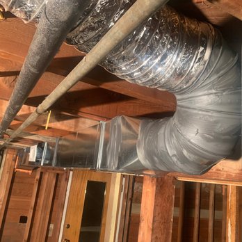 Washougal Heating & Cooling - Compilated duct runs - on the end against the wall there is a custom part they made on site to raise the duct 4" to be flush with my beam. - Heating & Air Conditioning/HVAC Near Me - Camas, Washington