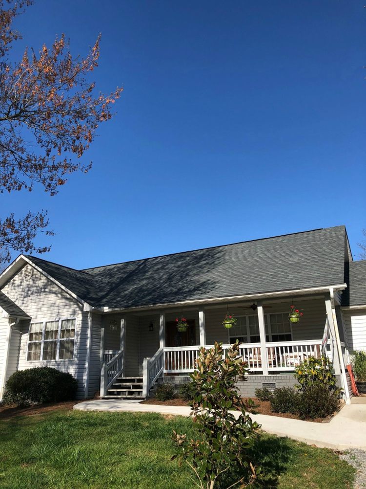 Slide of Sutton Roofing & Construction Company