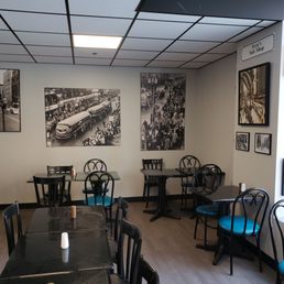 a dining room with tables and chairs
