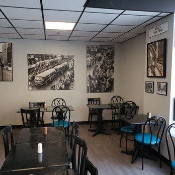 Fera's Lunch Hour - a dining room with tables and chairs - Sandwiches Near Me - Buffalo, New York