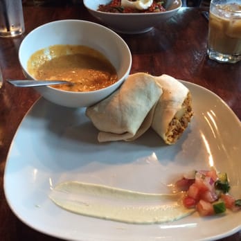 The Bitter Alibi - Breakfast burrito with chorizo gravy on the side - Bars Near Me - Chattanooga, Tennessee