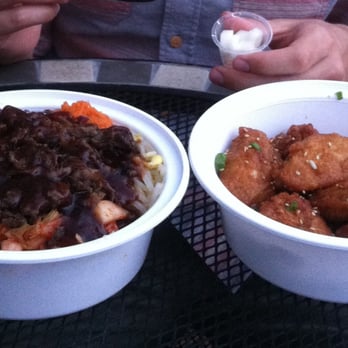 Kogi - Large Korean Chicks with Soy Garlic Sauce (ft. tiny serving of pickled radishes) and Ribeye Bulgogi bowl with all the vegetables - Korean Near Me - Richmond, Virginia Kogi - Large Korean Chicks with Soy Garlic Sauce (ft. tiny serving of pickled radishes) and Ribeye Bulgogi bowl with all the vegetables - Korean Near Me - Richmond, Virginia