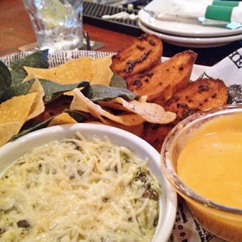 Killarney's Irish Pub & Grill - Spinach Artichoke Dip $7.90: Spinach & chokes in garlic cheese sauce. w/ garlic crustini & tortilla chips w/ Ale cheese spread. - Pubs Near Me - Temecula, California Killarney's Irish Pub & Grill - Spinach Artichoke Dip $7.90: Spinach & chokes in garlic cheese sauce. w/ garlic crustini & tortilla chips w/ Ale cheese spread. - Pubs Near Me - Temecula, California