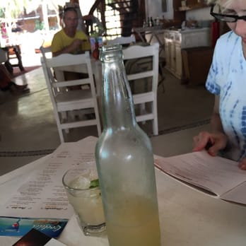 Mandarina Restaurant - Hidratante juice comes in a bottle, with plenty for 4 people to drink. - Mediterranean Near Me - Holbox, ROO Mandarina Restaurant - Hidratante juice comes in a bottle, with plenty for 4 people to drink. - Mediterranean Near Me - Holbox, ROO