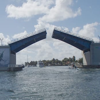 Las Olas Boulevard Bridge - North side of Las Olas Draw Bridge. Note Guy Harvey painting on left bridge pier. - Landmarks & Historical Buildings Near Me - Fort Lauderdale, Florida Las Olas Boulevard Bridge - North side of Las Olas Draw Bridge. Note Guy Harvey painting on left bridge pier. - Landmarks & Historical Buildings Near Me - Fort Lauderdale, Florida