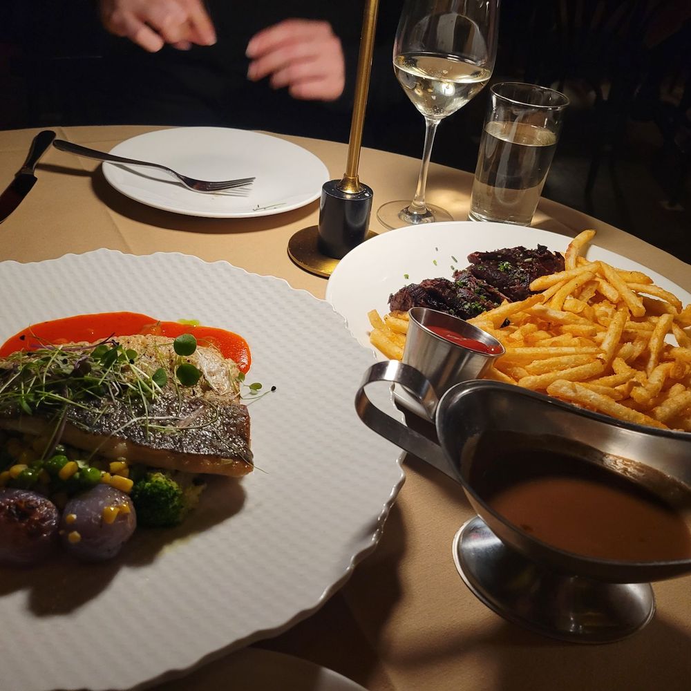 The Consulate - Midtown - Stripe bass and steak frites - French Near Me - New York, New York The Consulate - Midtown - Stripe bass and steak frites - French Near Me - New York, New York